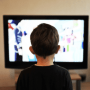 media consumption little boy in front of tv