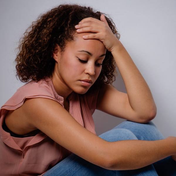 young ethnic woman looking upset