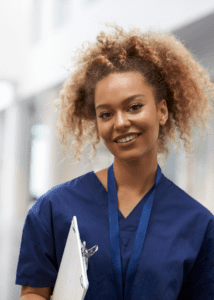 nurse in dark blue smiling