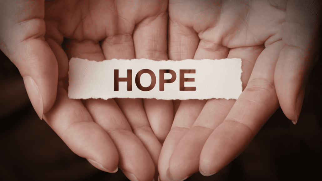 hand holding hope sign