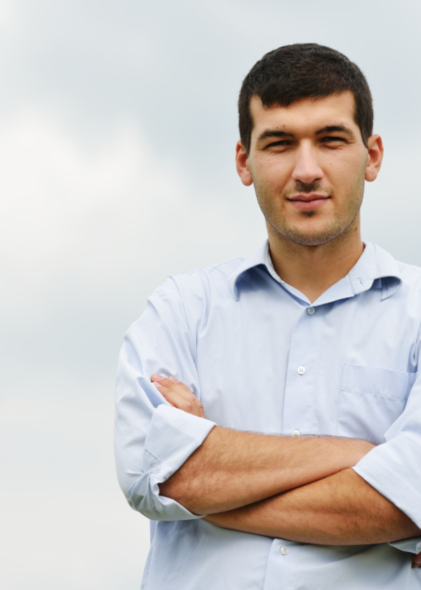 young man with arms folded