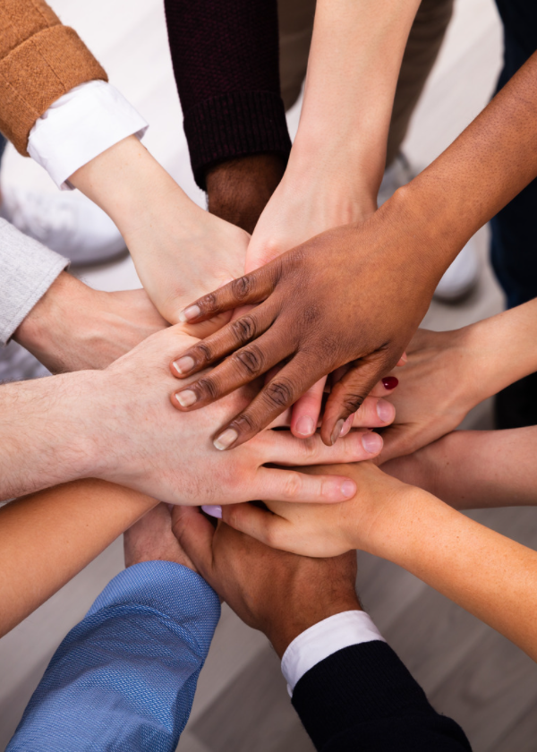 hands piled on top of each other