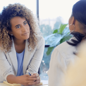 therapist talking to client stock image