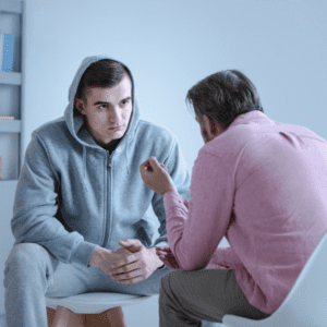 substance use therapist talking to client stock image