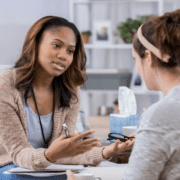 stock image of outpatient therapist talking to client