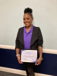 Domestic Violence Shelter Manager Tronda Burton with Heartland for Children Award