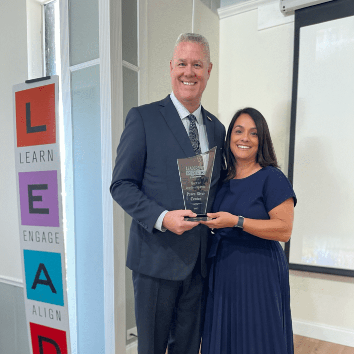 CEO Larry Williams and Director of Development and Community Relations Ileana Kniss with 2023 Spirit of Leadership Award